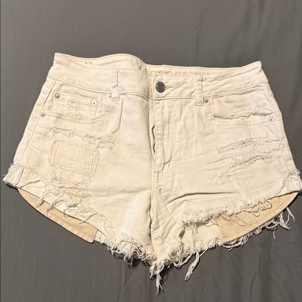 AE Hi-Rise Festival Distressed Off-White Denim Shorts